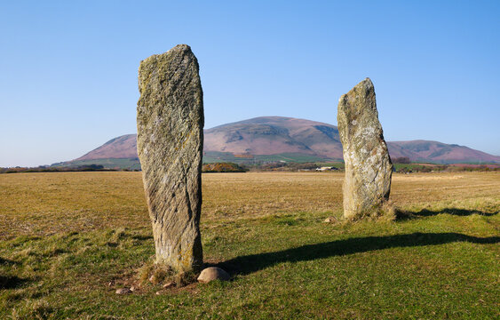 The Giants Grave megalithic Neolithic standing stones pair at Kirksanton, Cumbria stands between two crop marks of substantial henge and pit circles
