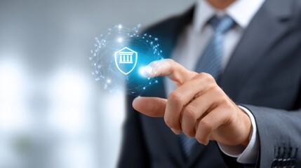 Fototapeta premium A businessman in a suit interacts with a digital shield icon symbolizing secure banking and financial protection.