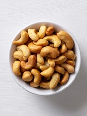 Fototapeta premium Healthy snack options cashew nuts in a bowl indoor setting food photography natural light