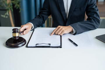 Lawyer Businessman Working with Lawbook and Gavel in Office or Courtroom for Justice Concept