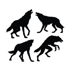 Four howling wolf silhouettes arranged in a circle silhouette.