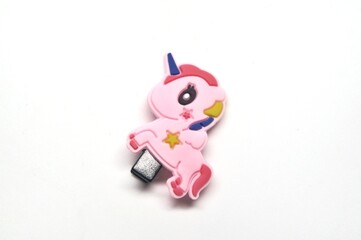 unicorn hair clip on white background