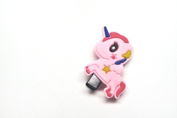 unicorn hair clip on white background