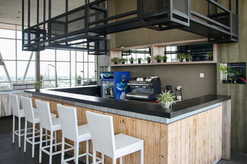 Modern Rooftop Bar Interior with City View and Coffee Station