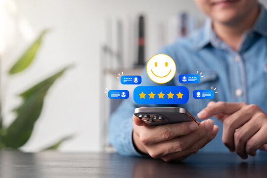 Customer review and satisfaction concept showing person using smartphone with five-star rating, smiley face icon, positive feedback, testimonial comments, and digital service evaluation system.