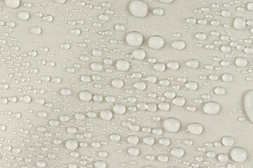 water drops on the white fabric, horizontal
