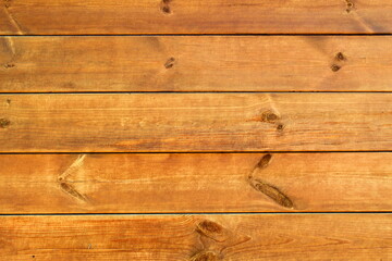 Fototapeta premium Texture of wooden panel painted in natural brown color.