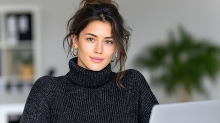Professional Young Female Office Worker in Black Sweater with Gold Hoop Earrings Focused on Typing in Business Environment