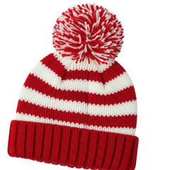 Striped knit winter hat with pom pom red and white isolated on transparent background