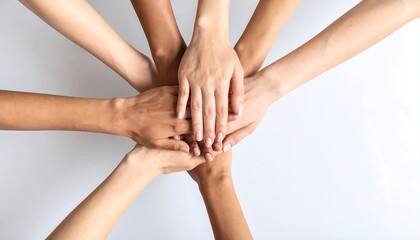 Fototapeta premium Diverse hands clasped together in a circle, forming a powerful unity