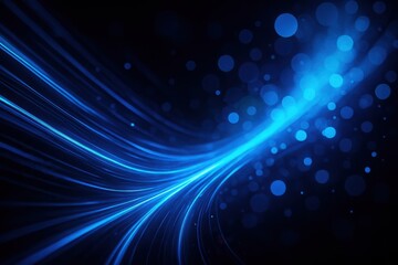 Fototapeta premium Abstract blue light trails and bokeh on a dark background