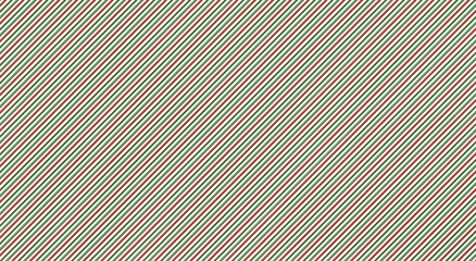 Seamless Diagonal Christmas Stripe Pattern in Red and Green with transparent background
