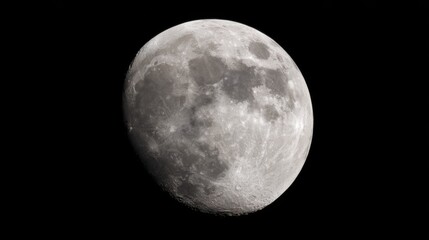 Obraz premium The crescent moon glows brightly against the dark night sky, casting a serene light over the landscape. Stars twinkle in the background, creating a peaceful ambiance.