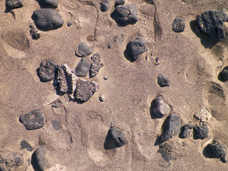 Rocks and sand - desert ground.