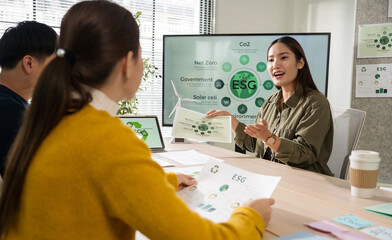 Asian business leaders meet to strategize on implementing sustainable practices, focusing on reuse, recycling, and environmental protection for a greener future