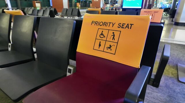 Slow motion shot of empty priority seats in an airport lounge