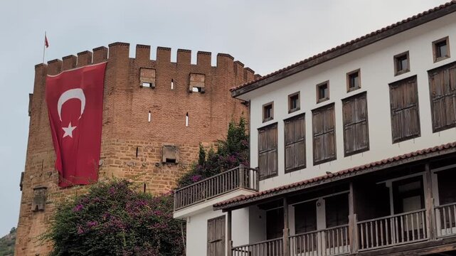Iconic view of the Red Tower (Kızıl Kule), a 13th-century Seljuk structure located in the coastal city of Alanya, Turkey.