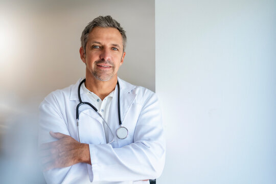 Portrait of confident doctor with arms crossed