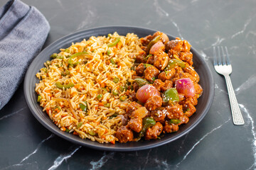 Soya Manchurian served with fried rice is a delicious, protein-rich Indo-Chinese combo featuring...