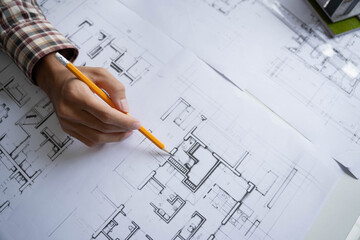 architect working on blueprints