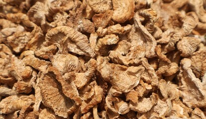 view of the unique texture of dried turnip, a testament to the age-old practice in Asia of dehydrating vegetables for extended storage and year-round consumption. Piles of dried turnip
