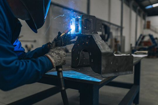 Welder welding machine part in factory