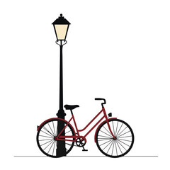 City bicycle leaning against lamppost, front