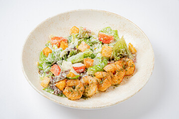 A lively mix of shrimp, fresh greens, and crunchy croutons creates a delightful dish