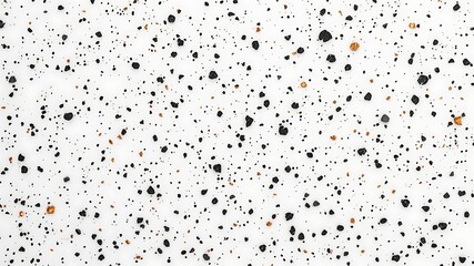 Abstract speckled pattern with black and gold details against a white background