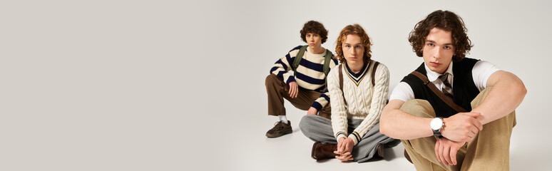 Young stylish friends come together for a trendy fashion moment in a modern atmosphere