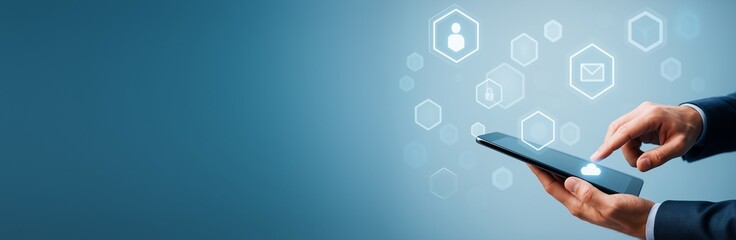 Businessman using digital tablet with cloud computing icons on blue tech background for technology promotion or advertising template.