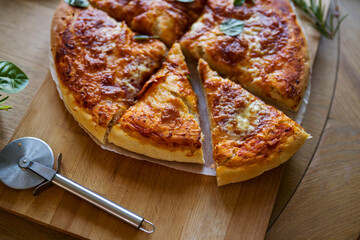 Slice of homemade cheese pizza, home baking
