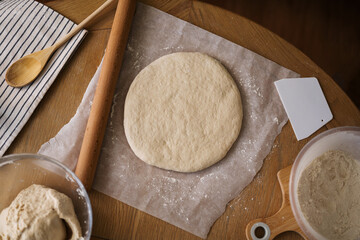 Cooking pizza, rolling dough, home baking
