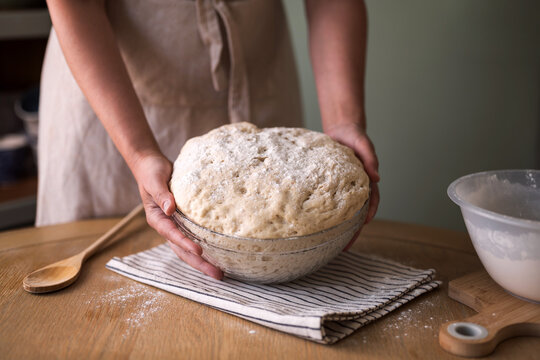 Dough for making pizza, home baking concept