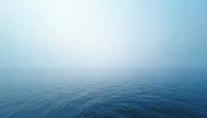 Obraz premium Tranquil blue seascape with ocean mist creating atmospheric depth. Endless horizon, calm water surface, conveying peaceful solitude, vast immensity. Dreamy, serene natural landscape for relaxation,