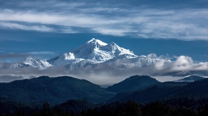 Snow-Covered Peak Elegance Under Azure Skies, Ethereal Clouds Framing Majestic Mountain, Dark Hills Adding Depth to Serene Landscape.