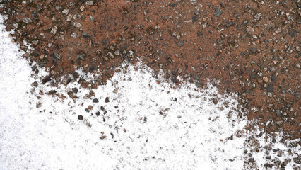 Snow Covering Small Stones on the Ground