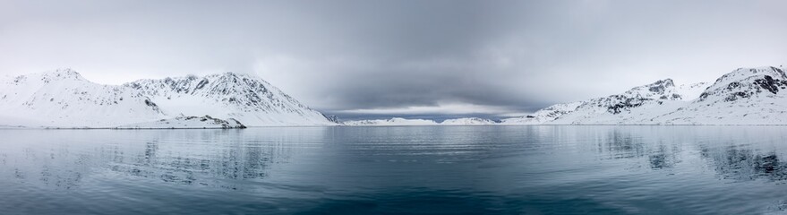 High resolution panorama - Amazing mountainous ice and snow landscapes with reflections, Svalbard, Norway