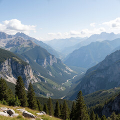 Obraz premium Scenic mountain landscape with forested valley and clear sky 