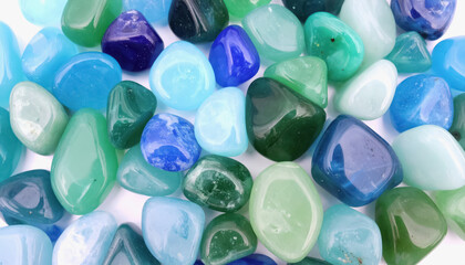 A pile of blue and green gems showcasing their unique features and textures related to energy stones