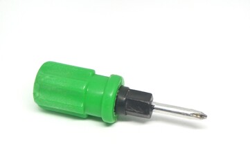 Green screwdriver handle on white background.