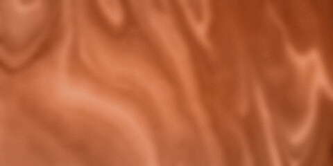 A close-up view of a textured, copper-colored surface. Shade from light to dark orange-brown, rose cold, brass, with a subtle variation in tones and modern, elegant surface background.
