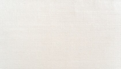 Close-up of a subtly textured, off-white fabric surface