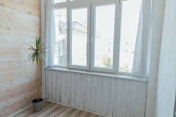 Interior of an empty room with a window