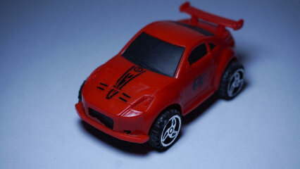red toy car on a white background