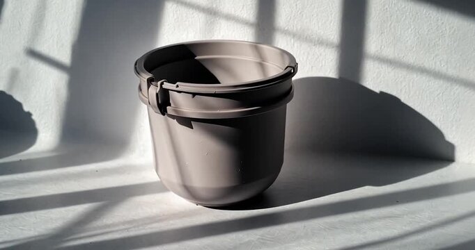 Coral plastic buckets with shadows