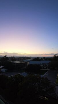 Sunrise/sunset over the city, with the Sydney skyline in the distance
