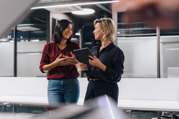 Businesswomen having discussion in office