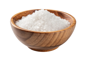 Wooden  bowl  filled  with  crystal  white  sea  salt  isolated  against  a  black  background