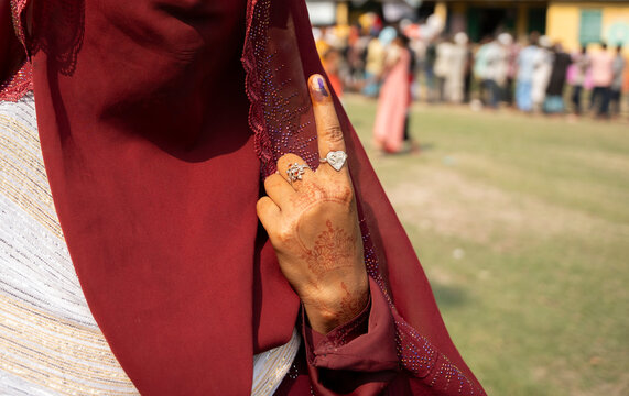 Ink marked finger after voting in election in India